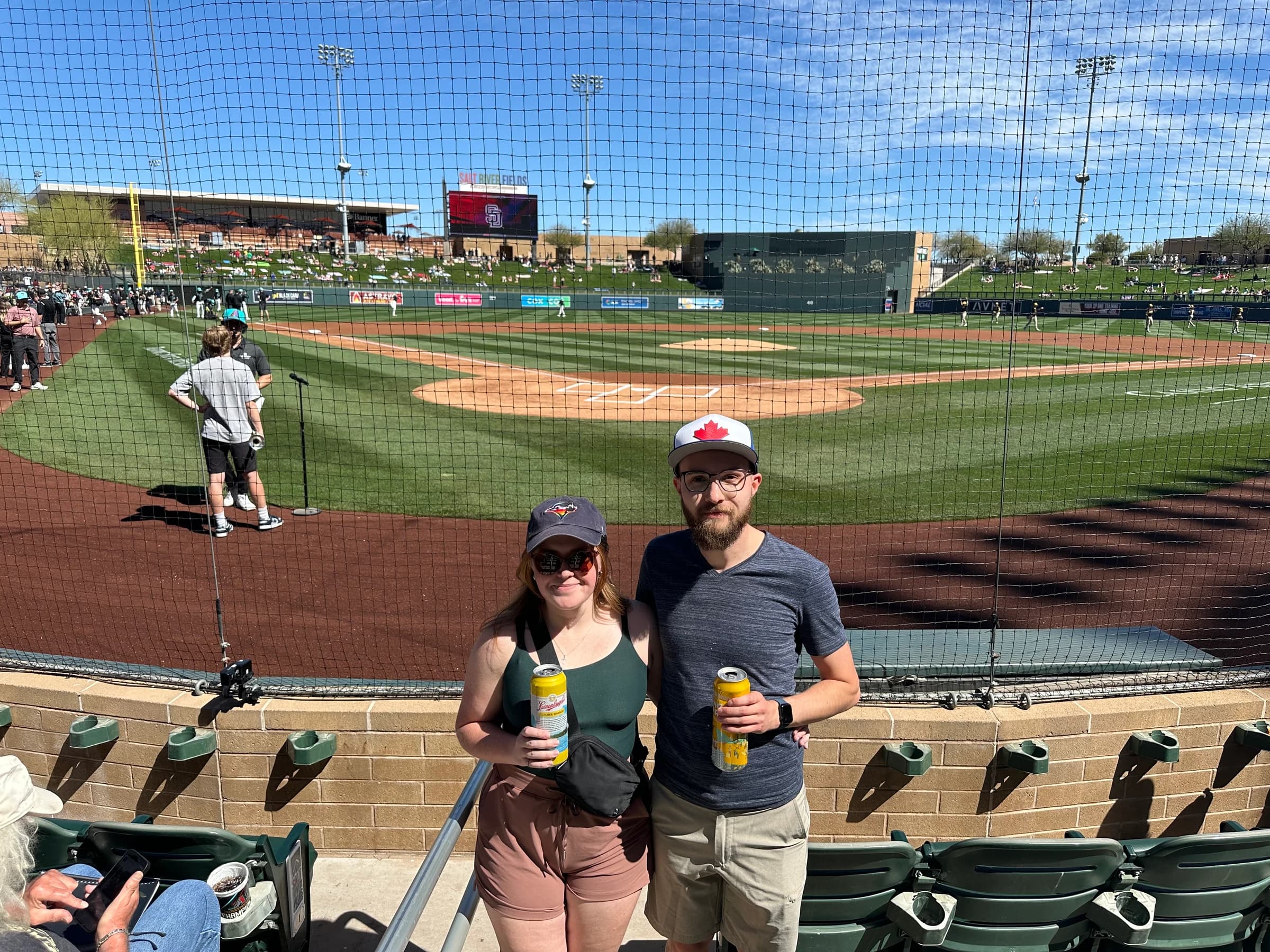 Rachel and Reid in front of the field at Salt River Fields